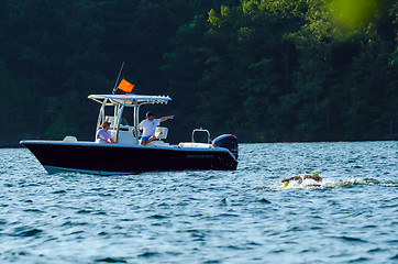 Image showing small rescue boat used during swimming competition