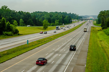 Image showing highway traffic near a big city