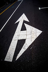 Image showing painted direction arrow on pavement