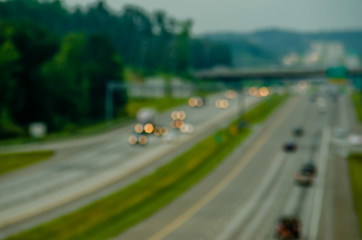 Image showing highway traffic near a big city out of focus