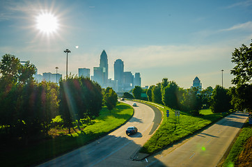 Image showing sun setting over charlotte north carolina a major metropolitan c