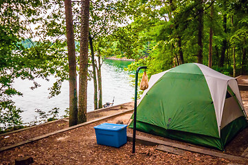 Image showing tent in forest on campground by the lake