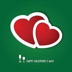 Image showing Two red hearts on dark green background. Valentine`s card.