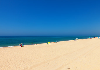 Image showing Beautiful tropical beach with bathers