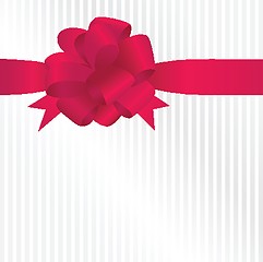 Image showing Shiny red satin ribbon on white background