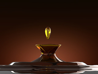 Image showing Alcoholic drink splash with droplet: cognac or whiskey