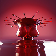 Image showing Splash and splatter of cherry juice or wine with droplets