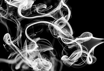 Image showing White abstract puff of smoke on black