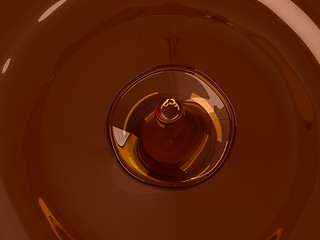 Image showing Alcoholic beverage splash with droplet: brandy or cognac