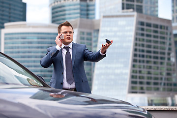 Image showing Businessman near a car