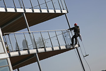Image showing Cleaning  and climbing