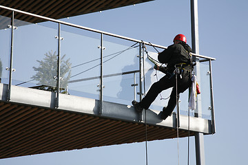 Image showing Cleaning  and climbing