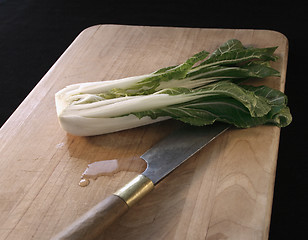 Image showing bok choy and knife on a cutting board