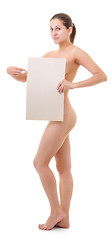 Image showing figure of a naked woman with poster