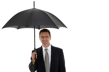 Image showing mature attractive business man with umbrella isolated