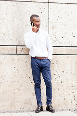 Image showing young successfil african businessman with mobilephone 