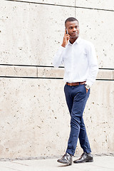 Image showing young successfil african businessman with mobilephone 