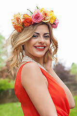 Image showing beautiful woman portrait outdoor with colorful flowers