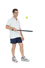 Image showing smiling adult tennis player with racket isolated