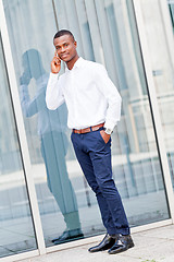 Image showing young successfil african businessman with mobilephone 