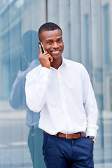 Image showing young successfil african businessman with mobilephone 