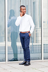 Image showing young successfil african businessman with mobilephone 