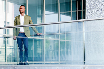 Image showing young successful african business man outdoor in summer