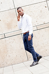 Image showing young successfil african businessman with mobilephone 