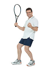 Image showing smiling adult tennis player with racket isolated