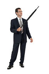 Image showing mature attractive business man with umbrella isolated