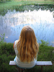 Image showing Young girl by lake