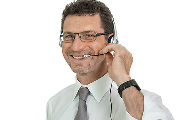 Image showing smiling mature male operator businessman with headset call senter