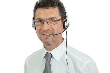 Image showing smiling mature male operator businessman with headset call senter