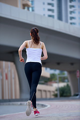 Image showing woman jogging at morning