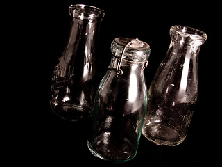 Image showing Three Antique Milk Bottles
