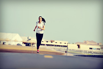 Image showing woman jogging at morning