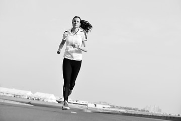 Image showing woman jogging at morning