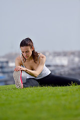 Image showing Young beautiful  woman jogging  on morning