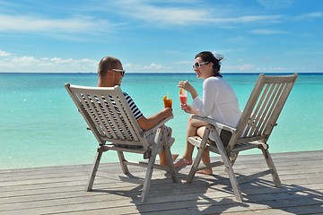 Image showing happy young couple relax and take fresh drink