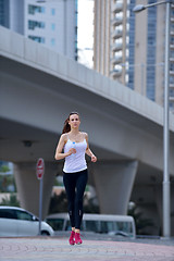 Image showing woman jogging at morning