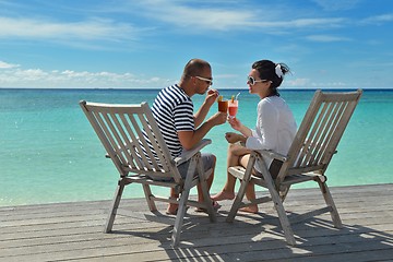 Image showing happy young couple relax and take fresh drink