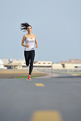 Image showing woman jogging at morning