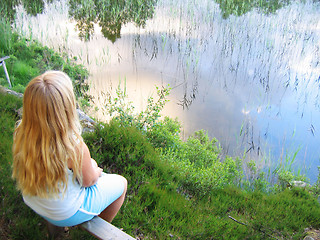 Image showing Small girl by lake