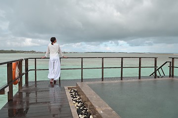 Image showing young woman relax on cloudy summer day