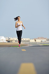 Image showing woman jogging at morning