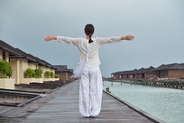 Image showing young woman relax on cloudy summer day