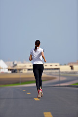 Image showing woman jogging at morning