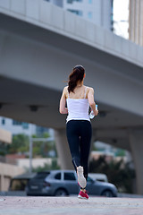 Image showing woman jogging at morning