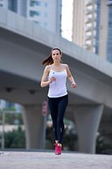 Image showing woman jogging at morning