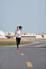 Image showing woman jogging at morning